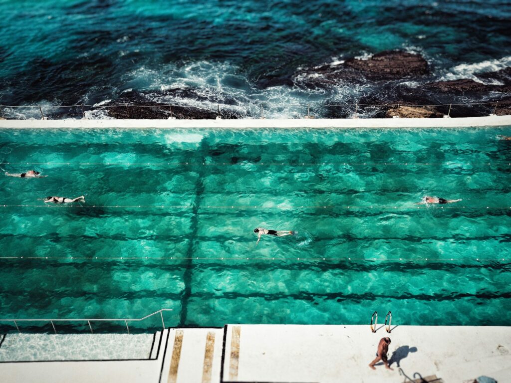 four people on swimming pool