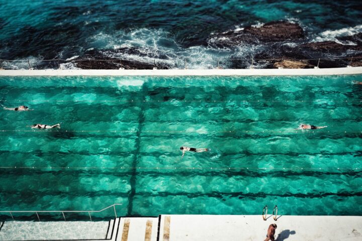 four people on swimming pool