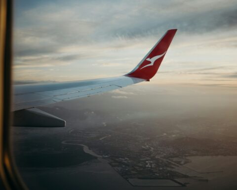 an airplane wing in the sky