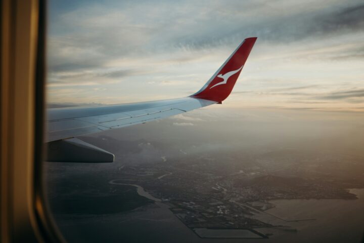 an airplane wing in the sky